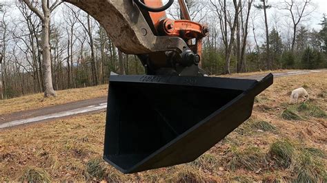 digging drainage ditch with mini excavator with ditching bucket|swivel bucket for mini excavator.